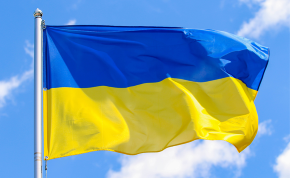 Image of the Ukrainian flag against a blue sky