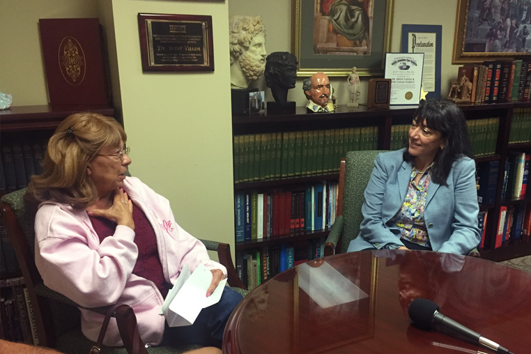Dr. Monica Bertagnelli speaks with community members